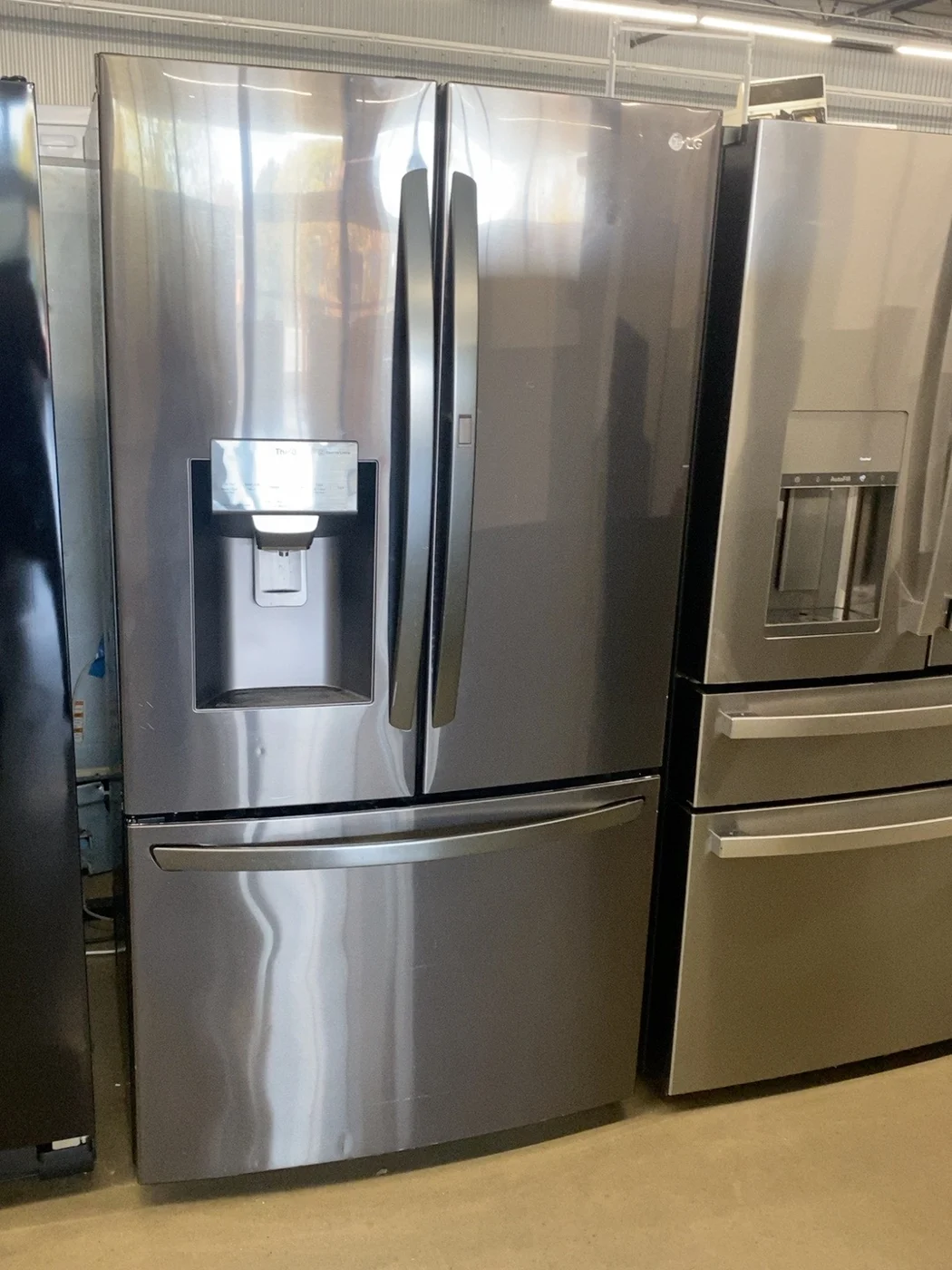 LG Three-door refrigerator with dispenser